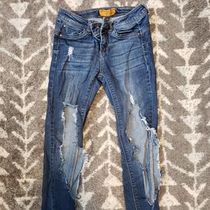 Cropped, ripped, butt jeans